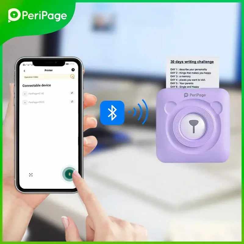 PeriPage A6 Mini Printer in purple with an open lid showing its inkless printing technology. The mini printer is compatible with colorful rolls, perfect for all creative print need
