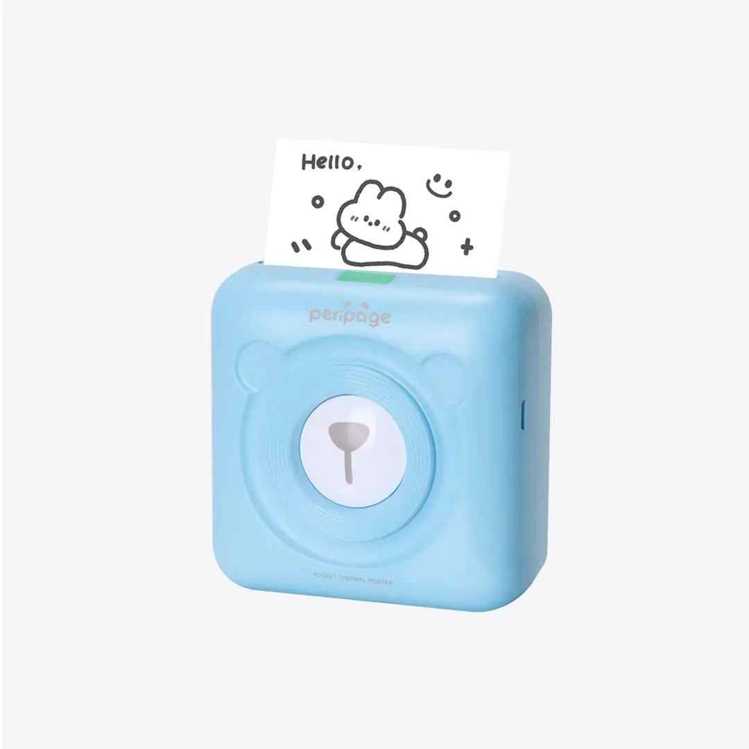 Light blue PeriPage mini thermal printer printing a cute note, pocket Bluetooth printer for photos and labels