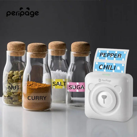 PeriPage A6 mini Bluetooth thermal printer printing colorful spice jar labels for kitchen organization, featuring inkless printing technology