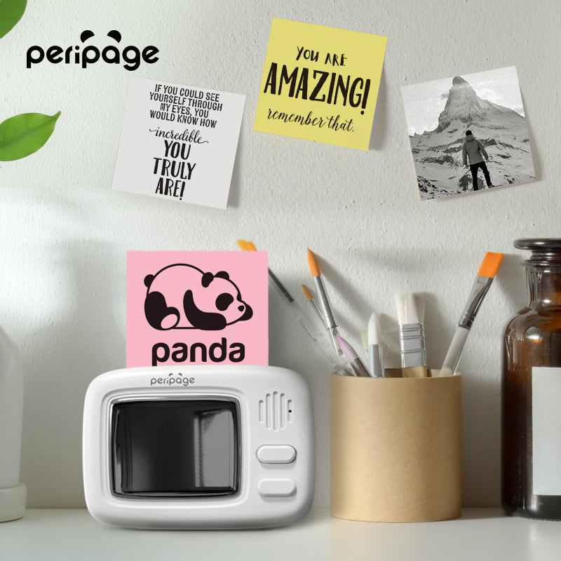 PeriPage A2 Portable Thermal Printer prints notes and photos, perfect for home or office use. Multiple prints displayed on the wall for decoration
