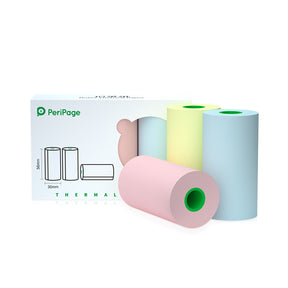 PeriPage 56×30mm Thermal Paper 3 Rolls in pastel colors placed in front of the product box, showing pink, yellow, and blue rolls.
